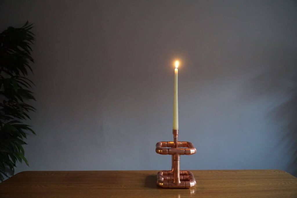 creative plumbing candle holder
